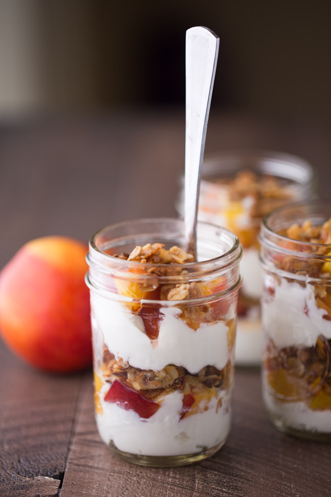 These delicious Roasted Nectarine Greek Yogurt Parfaits are simply made with fresh, juicy nectarines, homemade vanilla almond granola and Greek yogurt. | Small Green Kitchen