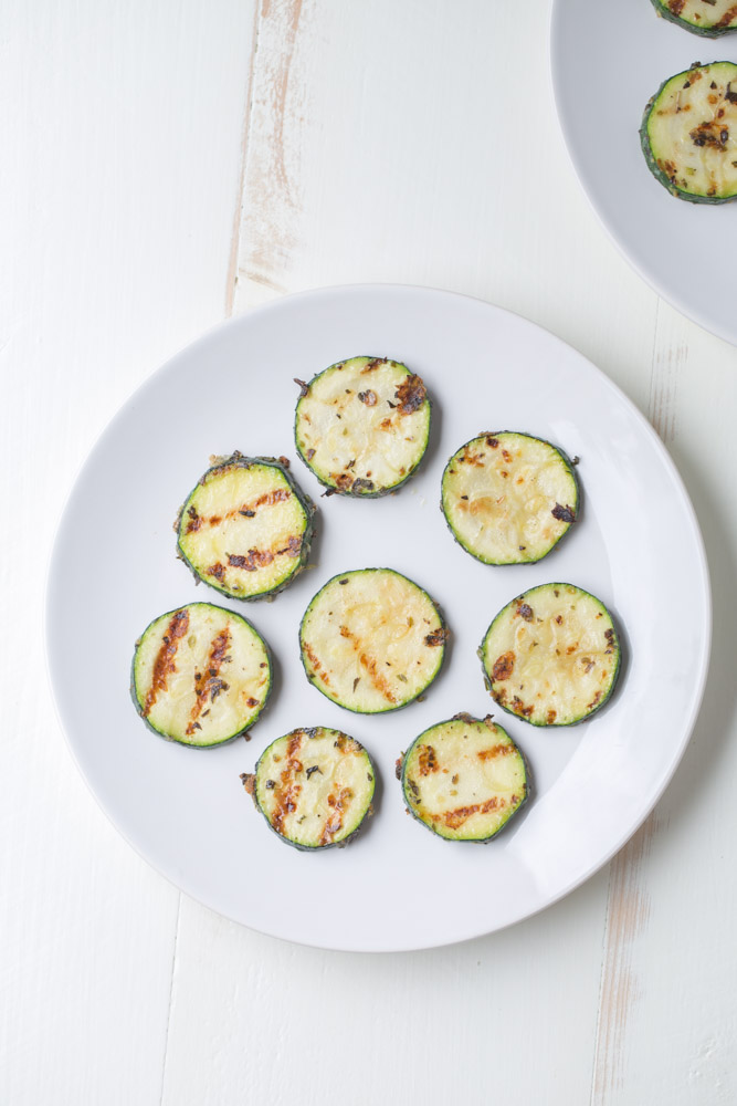 Garlic Parmesan Herb Zucchini. A healthier side dish alternative with no sugar and only 83 calories per serving! | This Gal Cooks