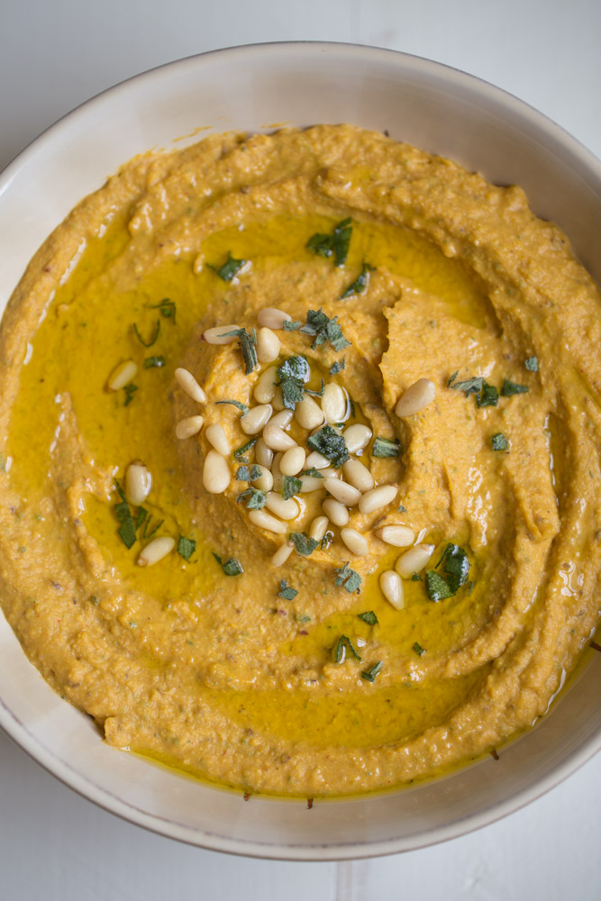 Pumpkin Hummus with cranberries and sage. Vegan + easy to make