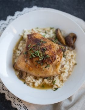 One Skillet Chicken Thighs and Mushrooms with Cauliflower Rice is an easy one skillet dinner recipe that’s ready to eat in under an hour. It’s low carb and gluten free and is made with real ingredients.