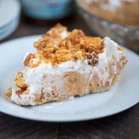 Easy Pumpkin Spice Pudding Pie. Flaky pie crust filled with pumpkin spice pudding, Cool Whip, pumpkin spice Oreos and topped with cool whip, cookies and caramel!