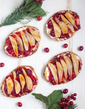 Cranberry Pear Flatbread. This super simple appetizer recipe makes a great addition to your Christmas appetizer menu! Great for snacking too!