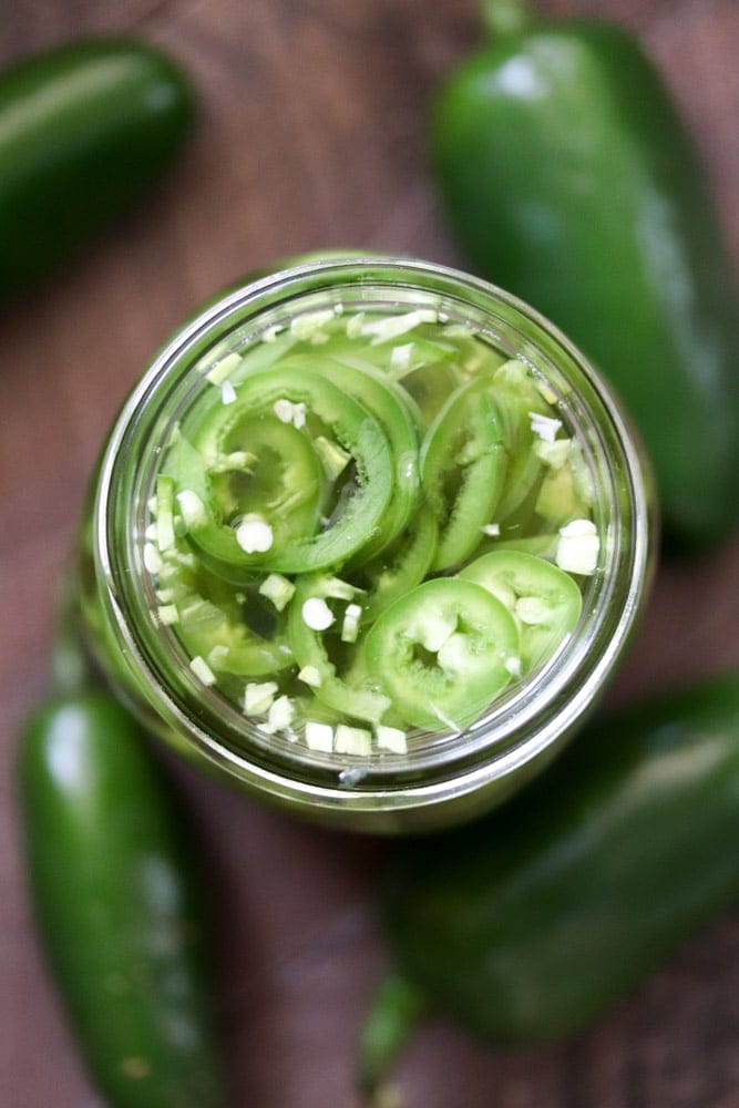 Quick pickled jalapeños are a life saver for jalapeno fans that want a pickled jalapeños right now! These pickled jalapeños are ready for use in all of your recipes in under an hour.