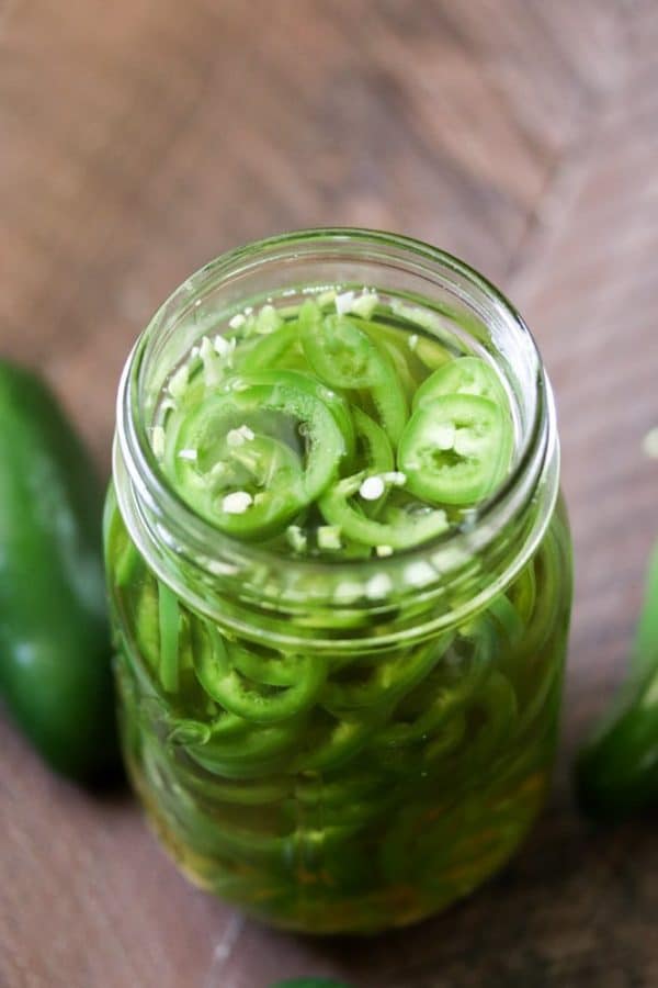 Quick pickled jalapeños are a life saver for jalapeno fans that want a pickled jalapeños right now! These pickled jalapeños are ready for use in all of your recipes in under an hour. 