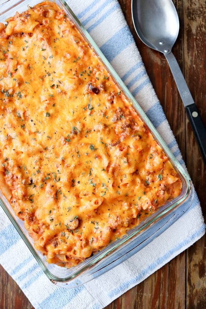 Easy gluten free pasta casserole is made with penne pasta, lean ground beef and ricotta cheese. This filling and delicious casserole will feed a crowd or provide a small family with lots of leftovers!