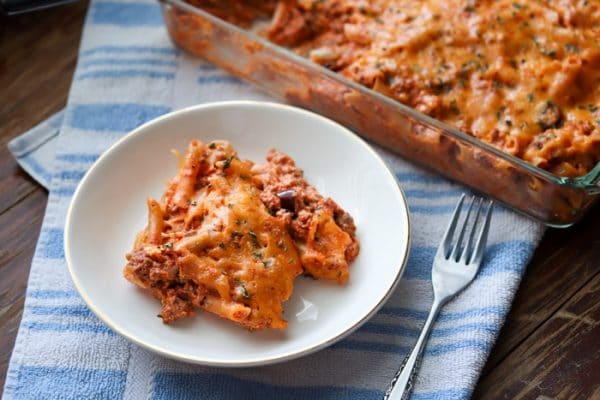 Easy gluten free pasta casserole is made with penne pasta, lean ground beef and ricotta cheese. This filling and delicious casserole will feed a crowd or provide a small family with lots of leftovers!