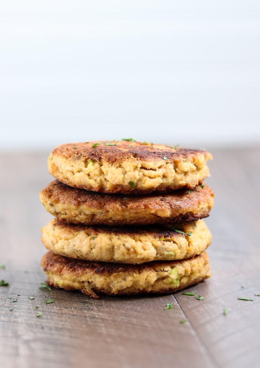 The easiest salmon cakes you'll ever make! These paleo salmon cakes are made with canned salmon, paleo mayo, spices, and almond flour! Serve them as an appetizer or with your favorite veggie for a complete healthy meal. #paleo #salmon #savory #dinner #appetizer