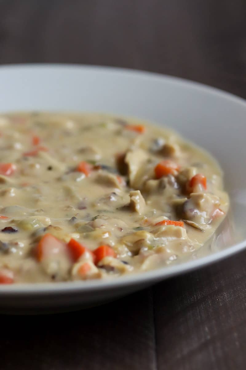 Turkey Wild Rice Soup is a thick and hearty soup that's perfect for a chilly day. Use up leftover turkey, herbs and veggies from your holiday dinner to make this delicious soup!